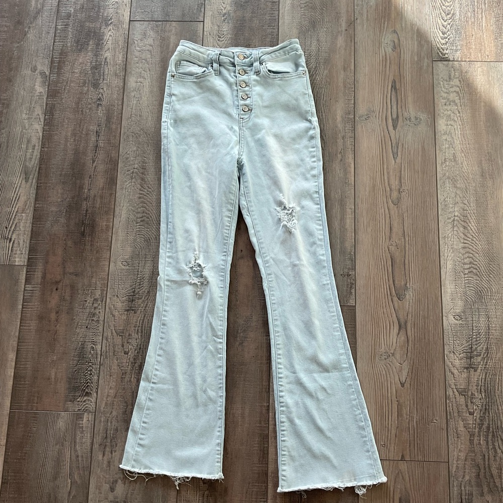 Light blue high-waisted distressed jeans
